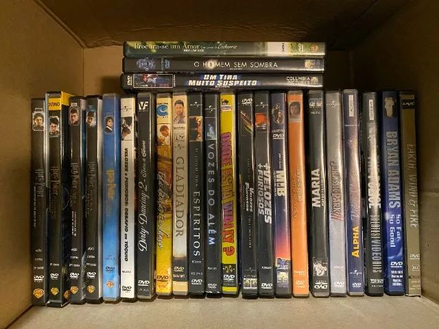 Lote de 53 CDs e 38 DVDs