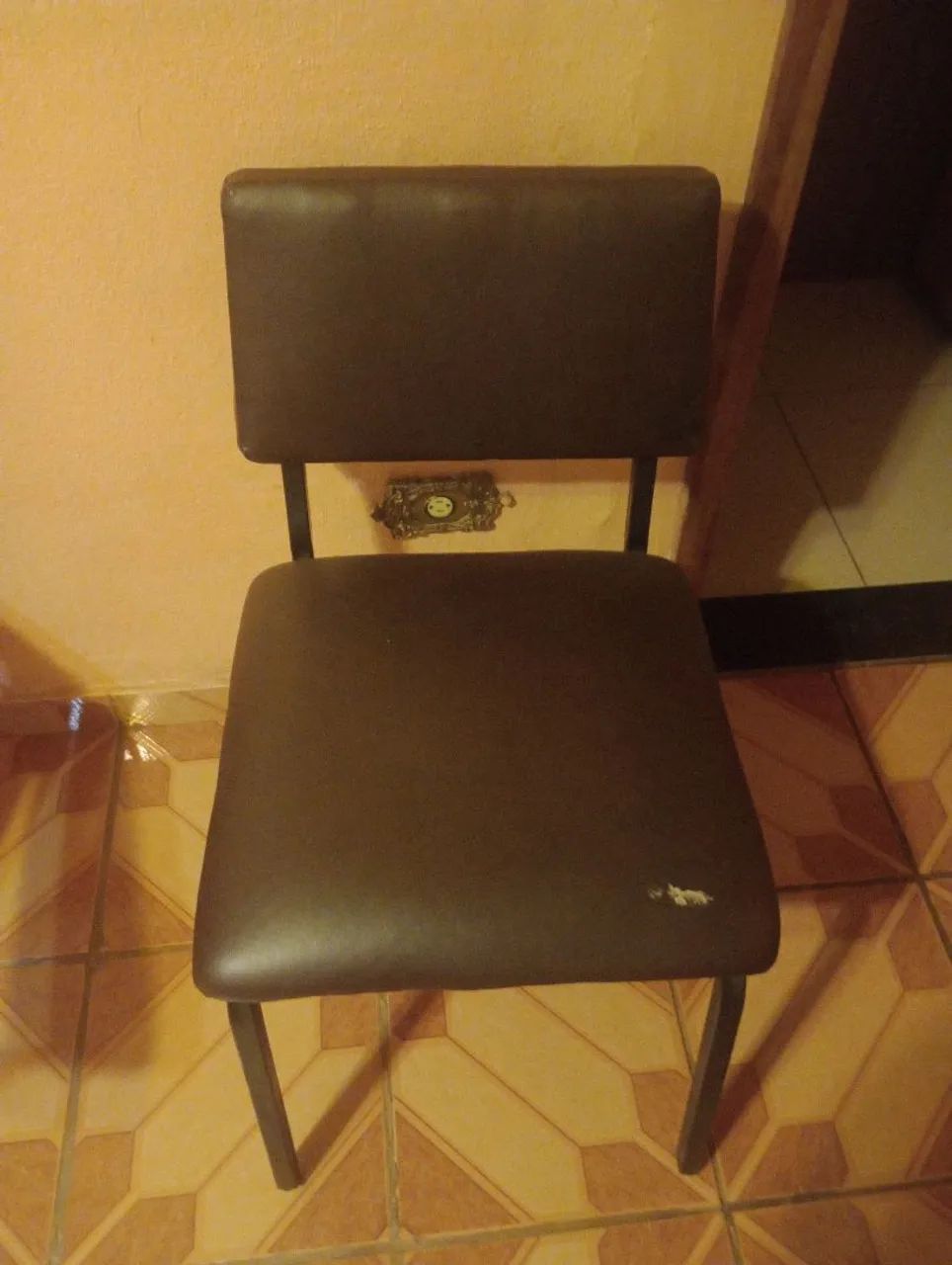Cadeira estofada