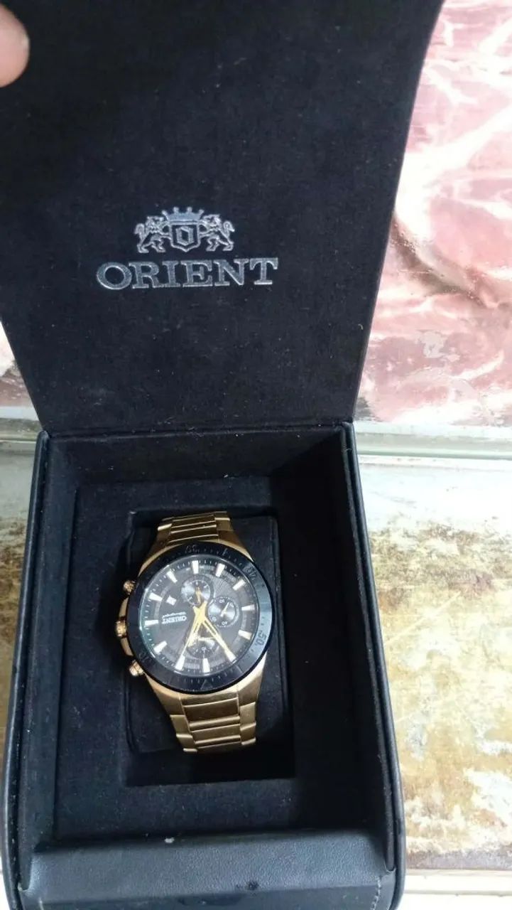 Relógio oriente dourado semi novo  - Foto 4