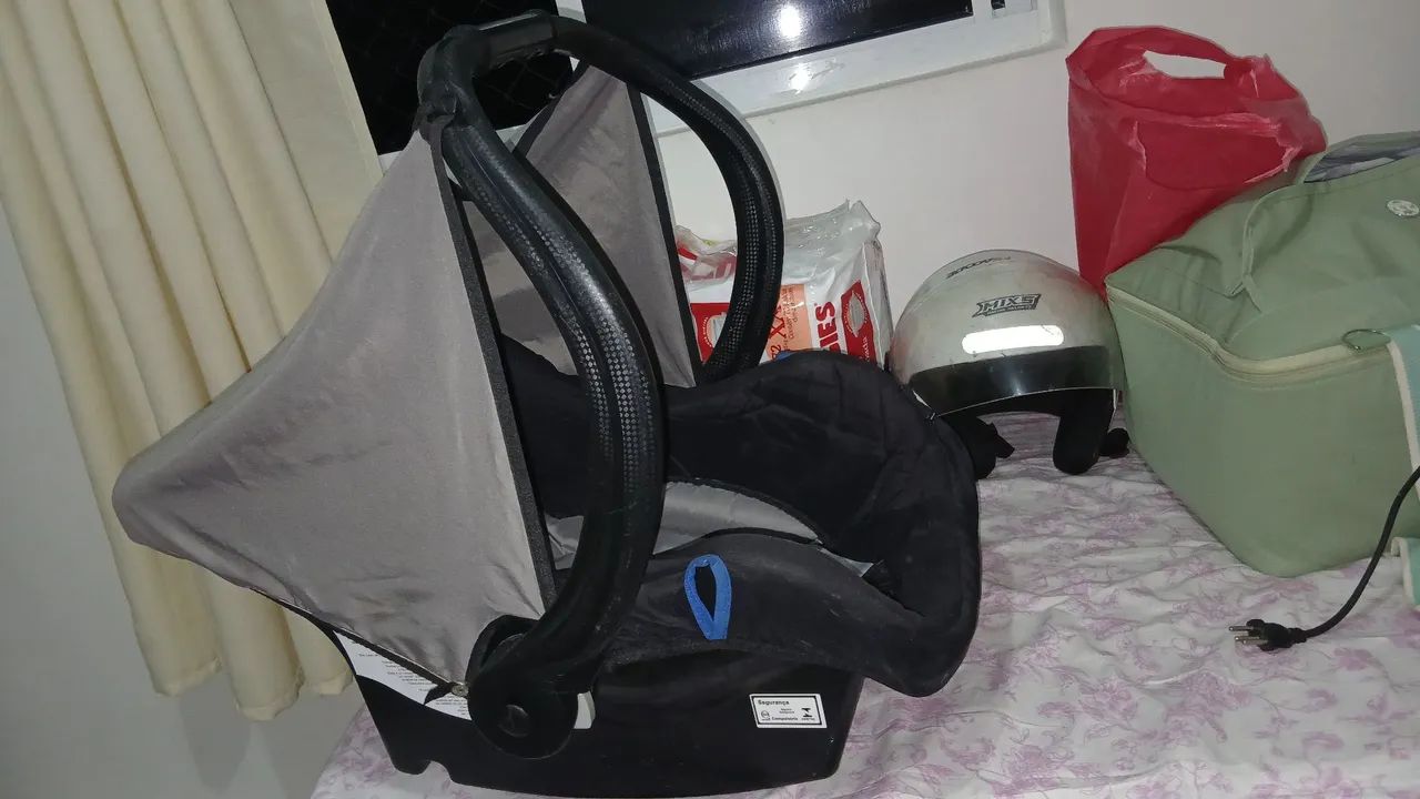 Bebê Conforto  ( semi - usado ) 