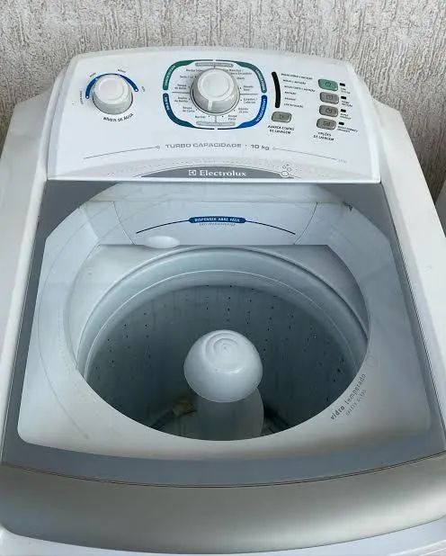 Vendo máquina 12 kilos usada 