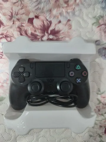 Coontrole de ps4 na caixa
