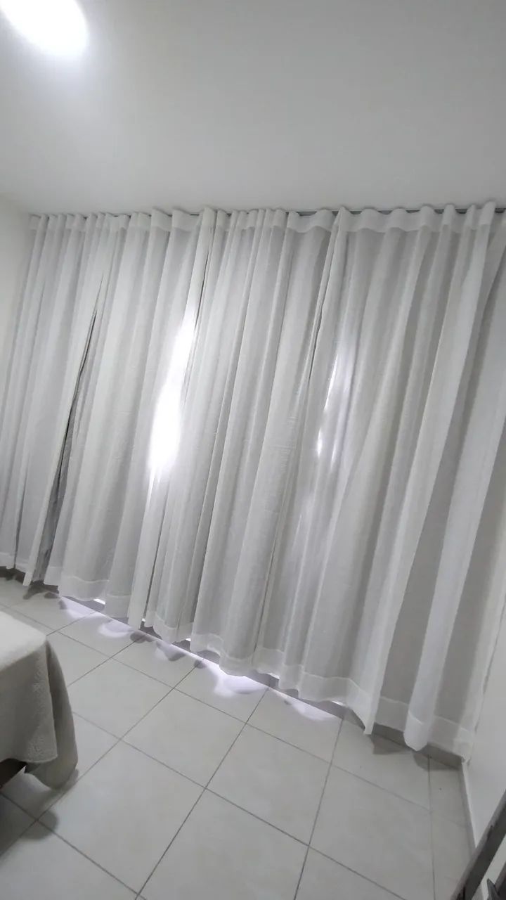 Instalação de cortinas persianas e trilhos suíço 