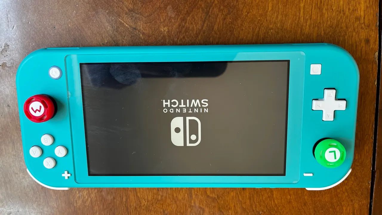 Nintendo Switch Lite Turquesa(bloqueado) com Case e Capas