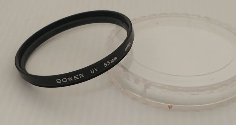 Filtro tipo Ultra Violeta (UV) para fotografia . Rosca 55mm marca Bower - usado - Foto 3