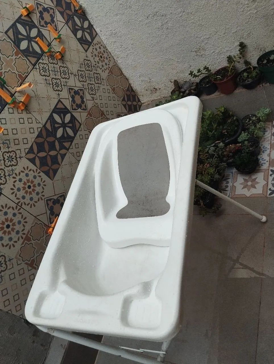 Banheira com suporte para banho