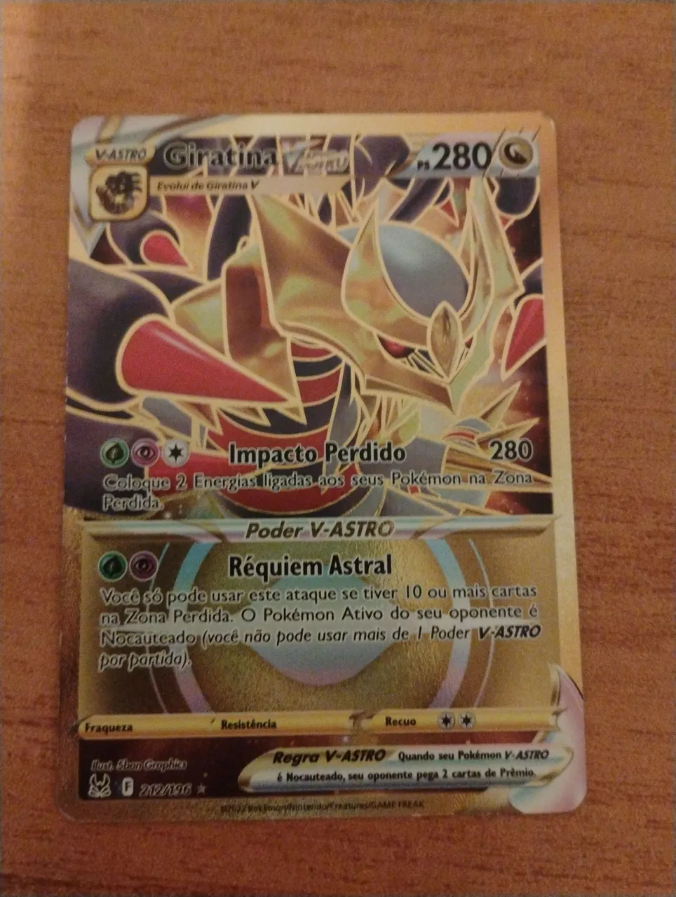 Carta de pokémon rara Giratina vastro gold