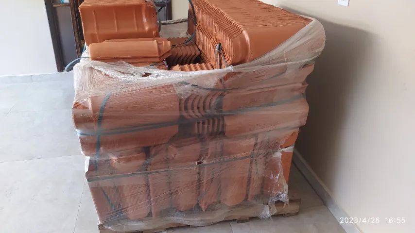 New American-style roof tiles – varnished, banded, and palletized (leftover from renovation)
