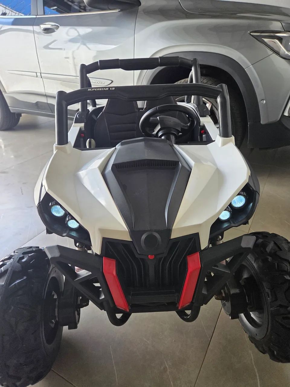 Carrinho elétrico infantil buggt 4x4 UTV 12v - Foto 2