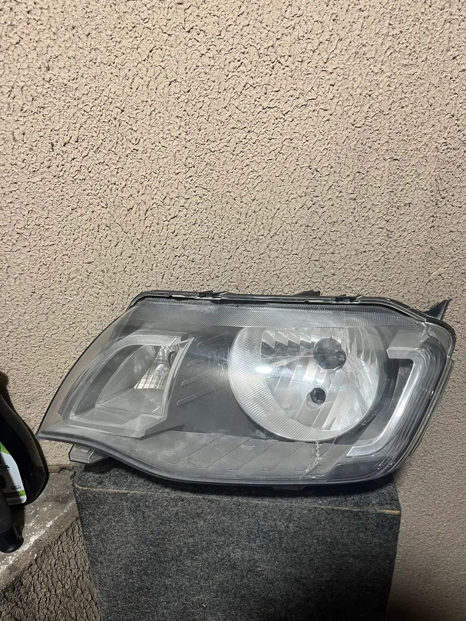 Farol esquerdo original (lado motorista) Kwid 
