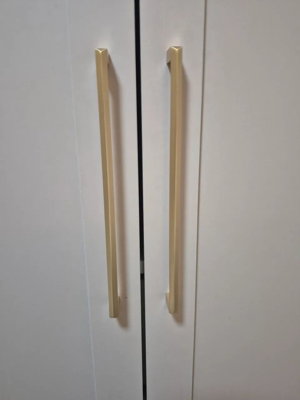 Puchador para guarda-roupa