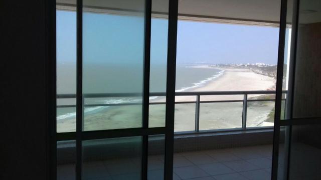 Alugo apto com 4 suites na frente do mar