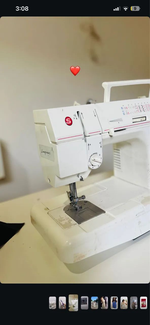 Máquina de costura singer