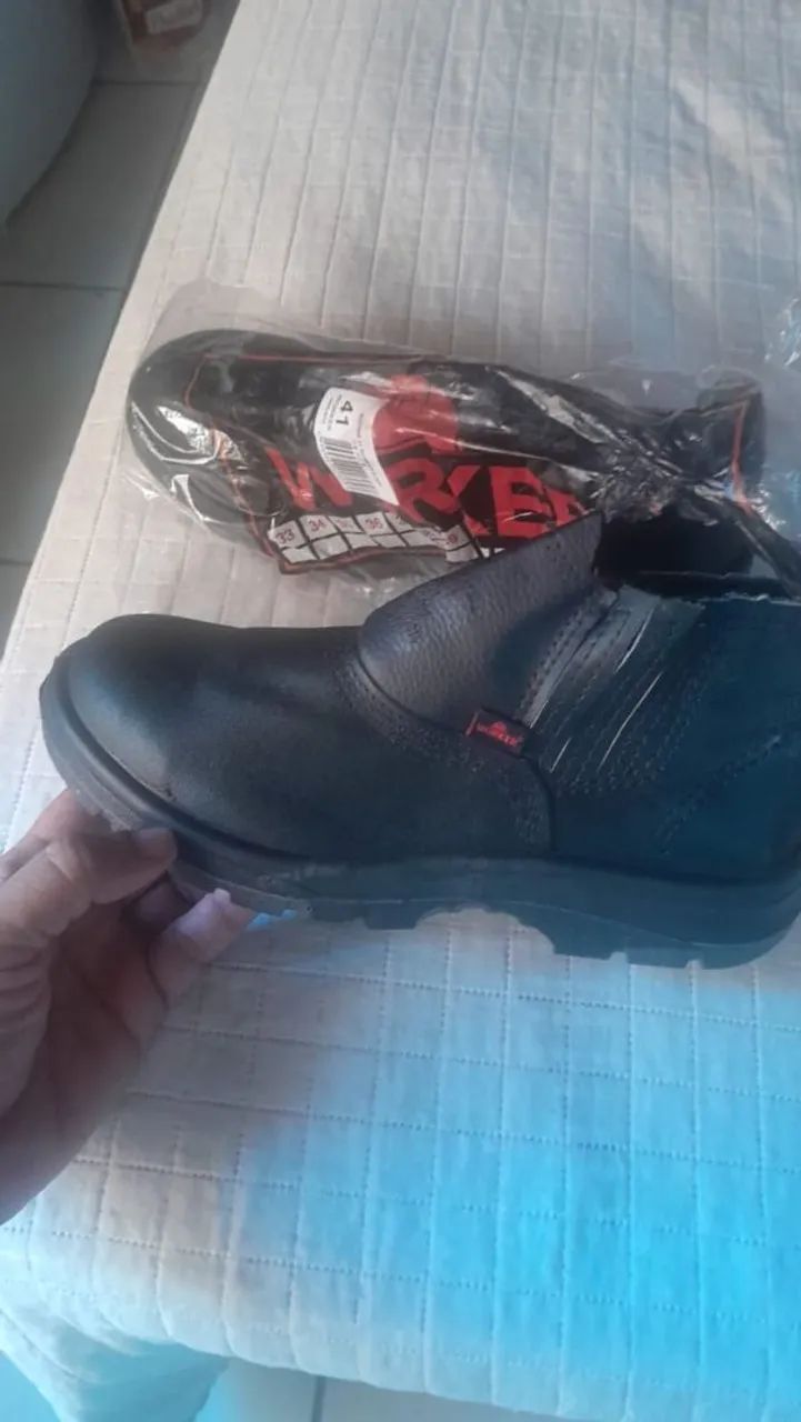 Vendo essa bota  nova valor  60 $ - Foto 2