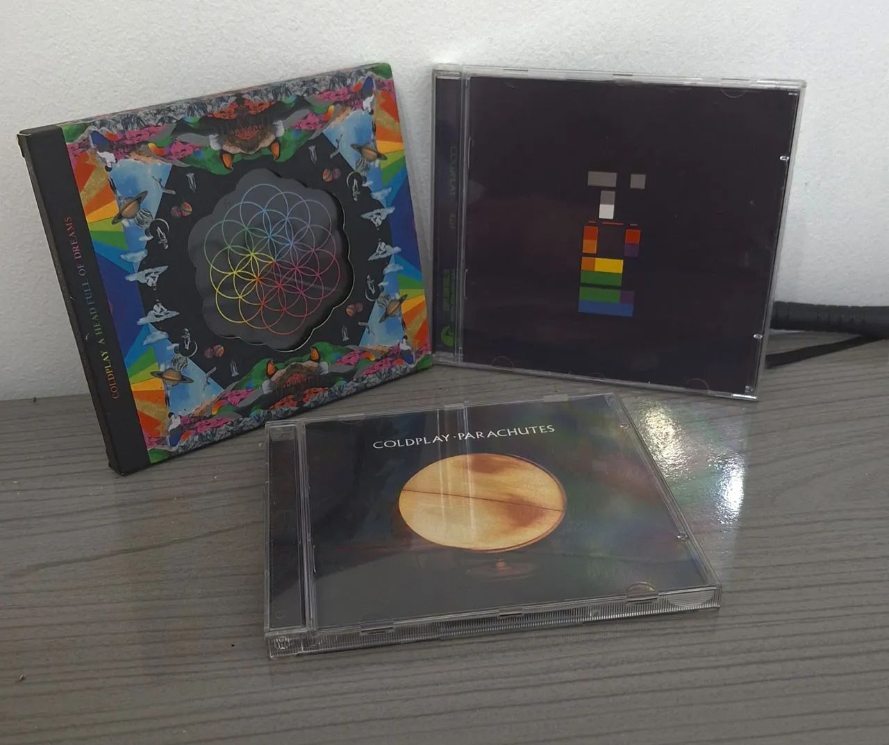 Cds Coldplay excelente estado são 3 pelo valor anúncio 