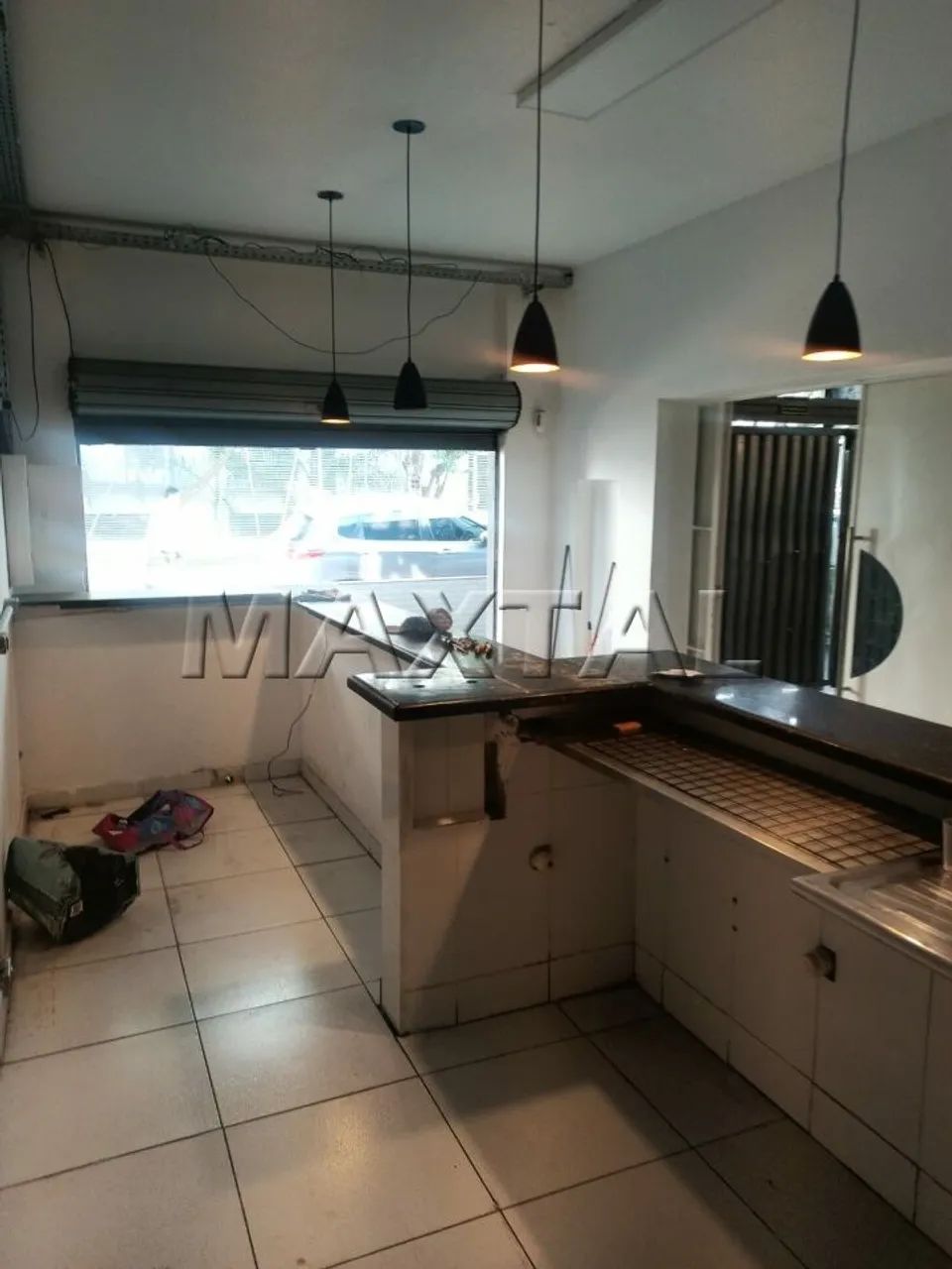 Loja com 100m² de área construída, salão amplo, copa, cozinha e 2 banheiros. - Foto 3