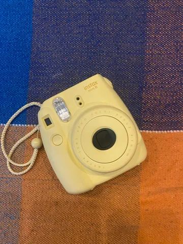 pastel yellow instax camera