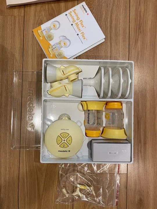 Extrator de leite duplo, sutiã e frascos da Medela - Foto 3