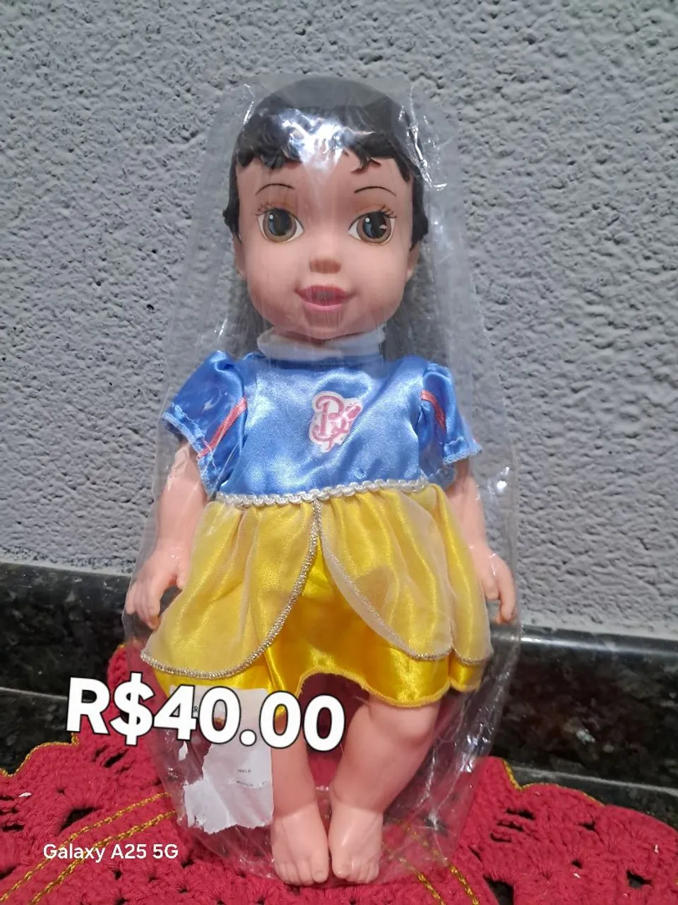 Bonecas novas e usadas