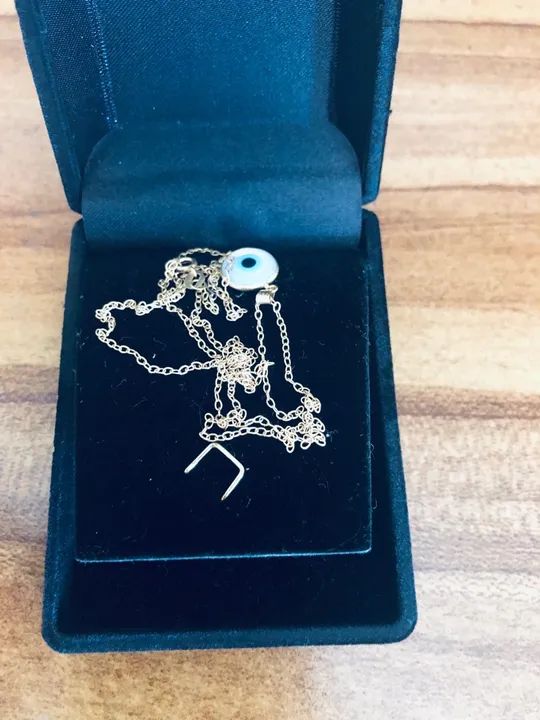 Cordão de ouro com pingente