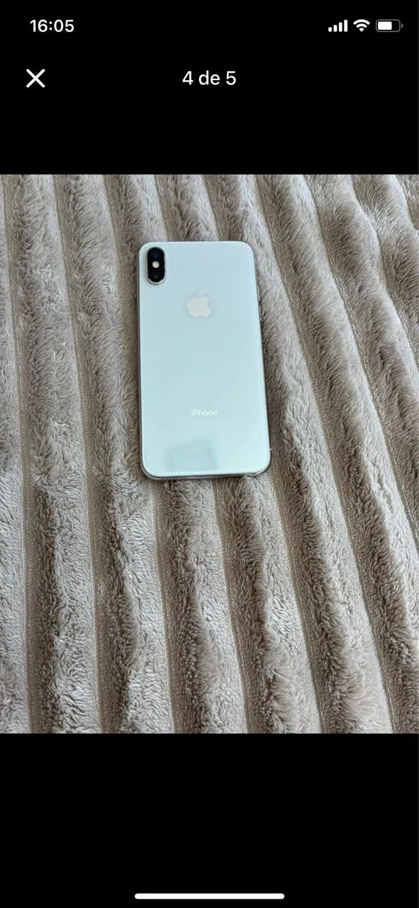 iPhone X  está com uns trincado na tela e traseira menor valor 400