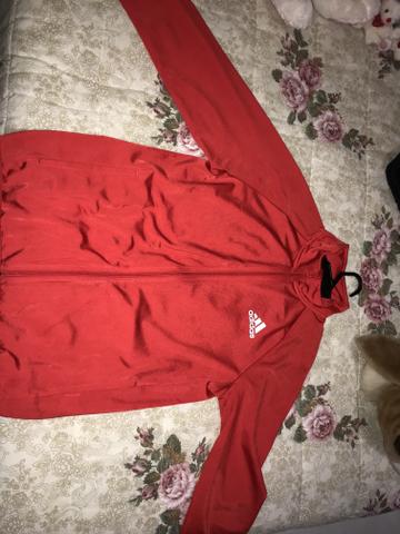 casaco refletivo adidas