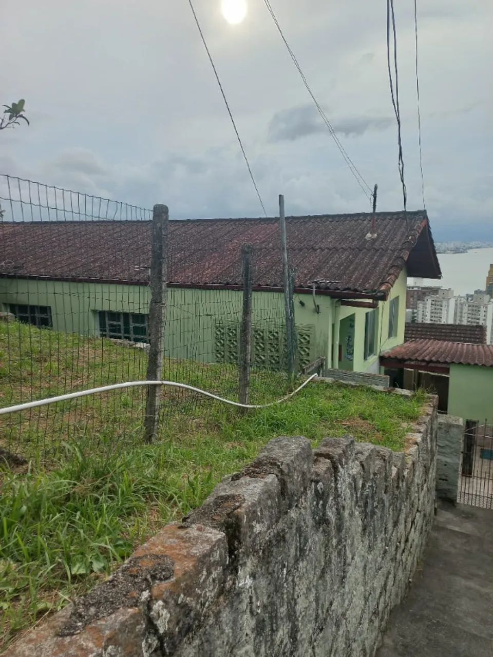 Terreno com casa 