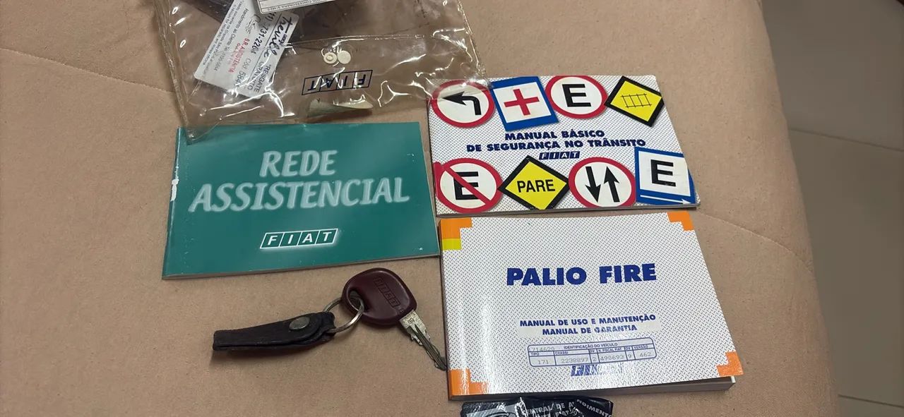 Vendo manual com chave reserva palio - Foto 2