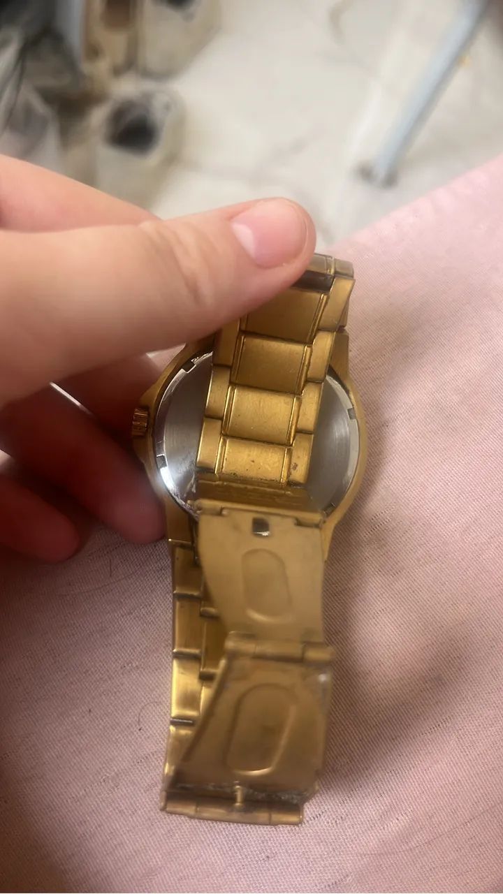 Relógio Orient dourado masculino 