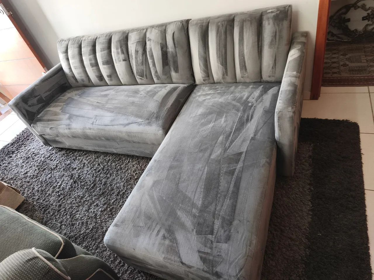 Sofá reclinável com chaise e baú 