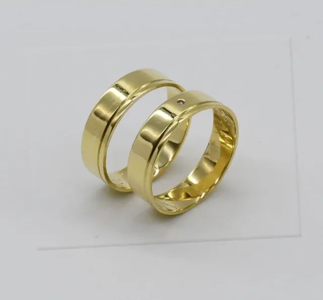 Par de Alianças Ouro 18k.