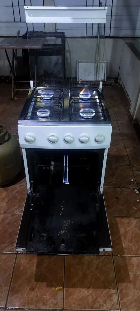 Vendo Fogão 4 Bocas funcionando perfeitamente entrego grátis  - Foto 2