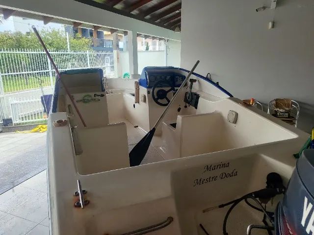 Lancha 17 pes 60HP Yamaha, direção hidráulica, som JBL, motor 4HP reserva com suporte inox - Foto 12
