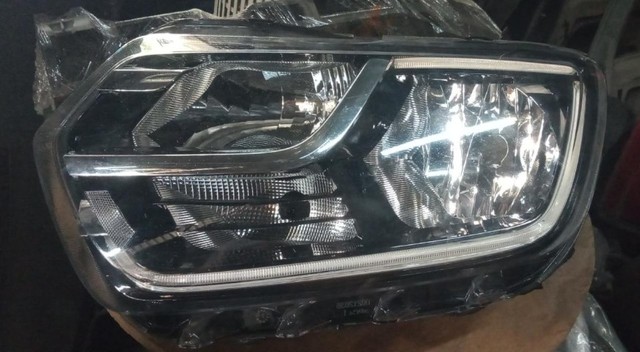 Farol Duster lado esquerdo 21/22