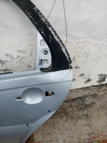 Porta traseira esquerda palio com furo - Foto 2