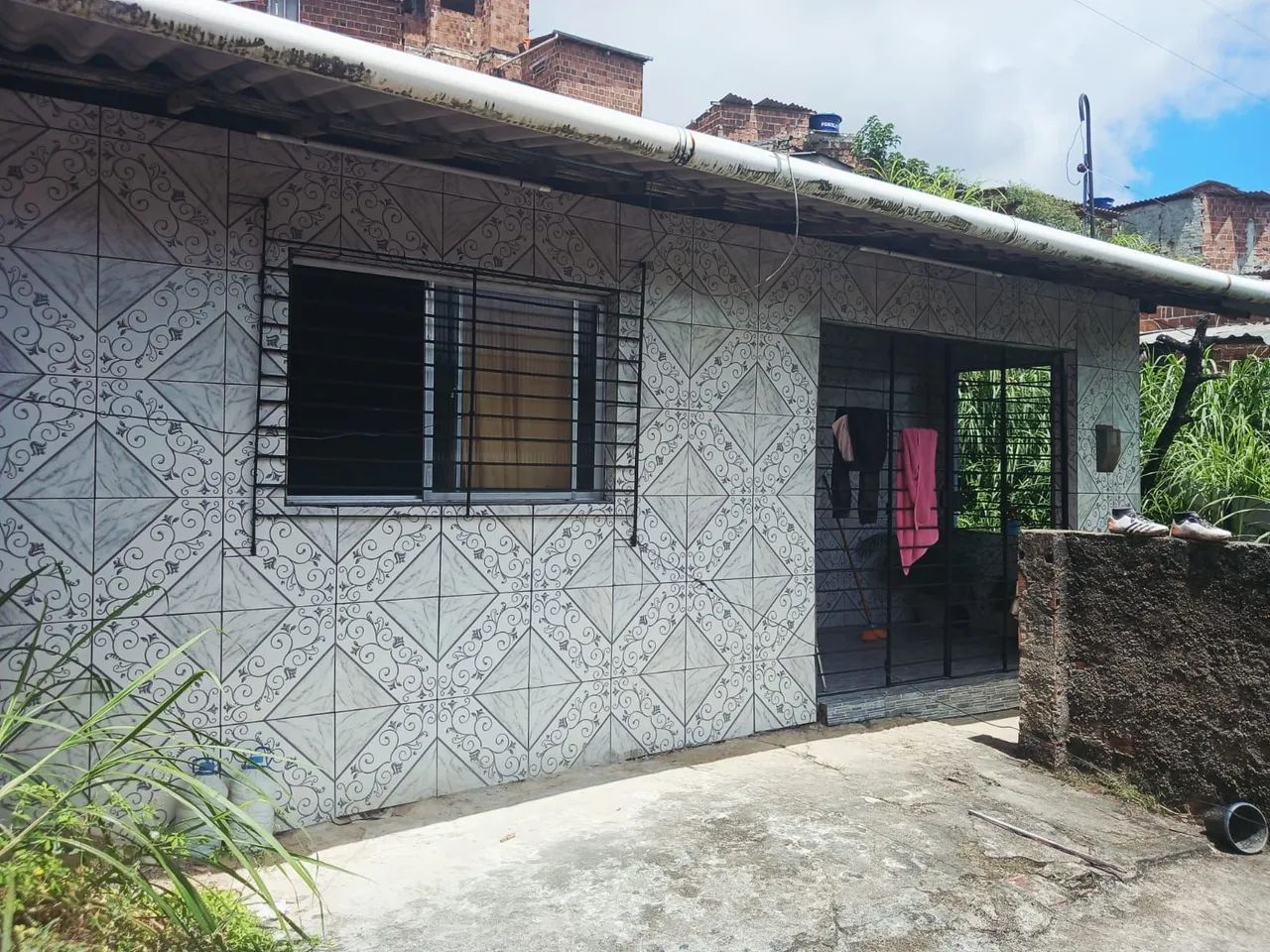 Casa com quintal a venda 