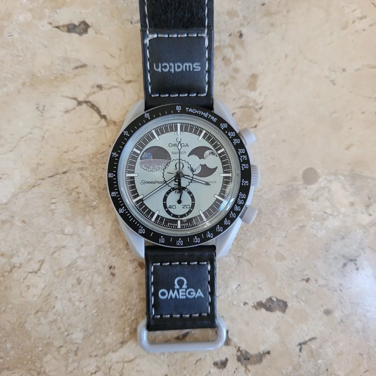 Relógio omega moonswatch com planeta 