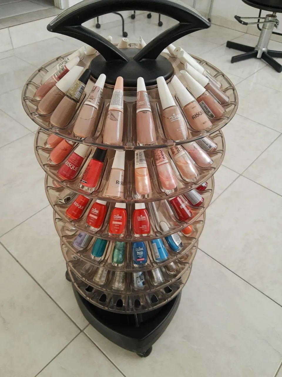 Expositor de esmaltes,  de acrílico.