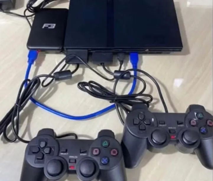 Ps2 com 2 controles e cabos, com mais de 2400 jogos 