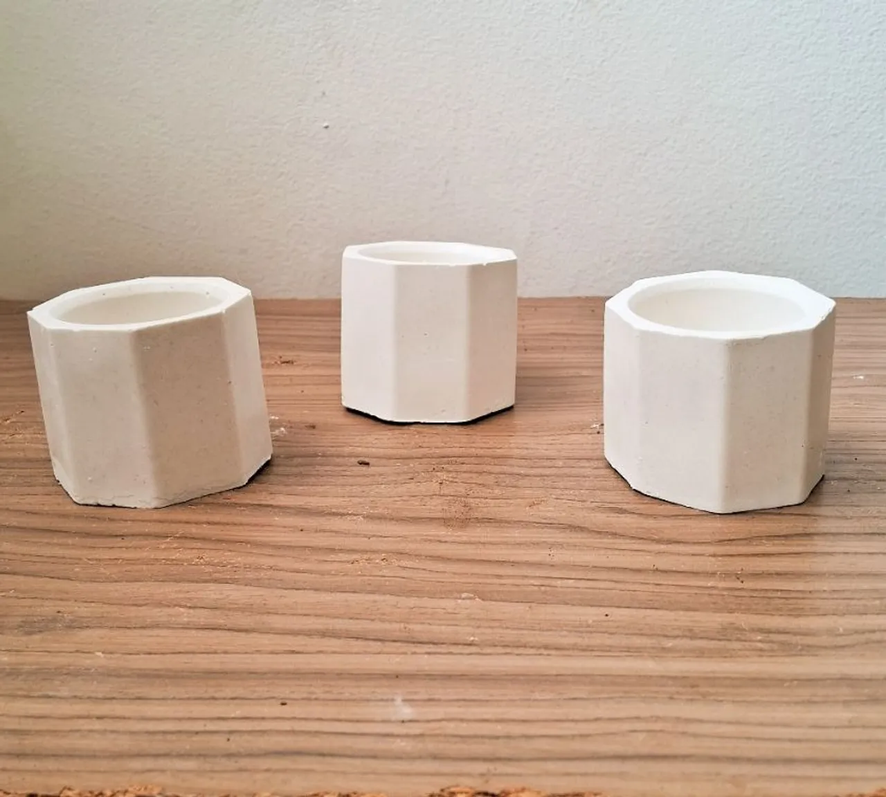 Vasos geométricos de cimento para plantas