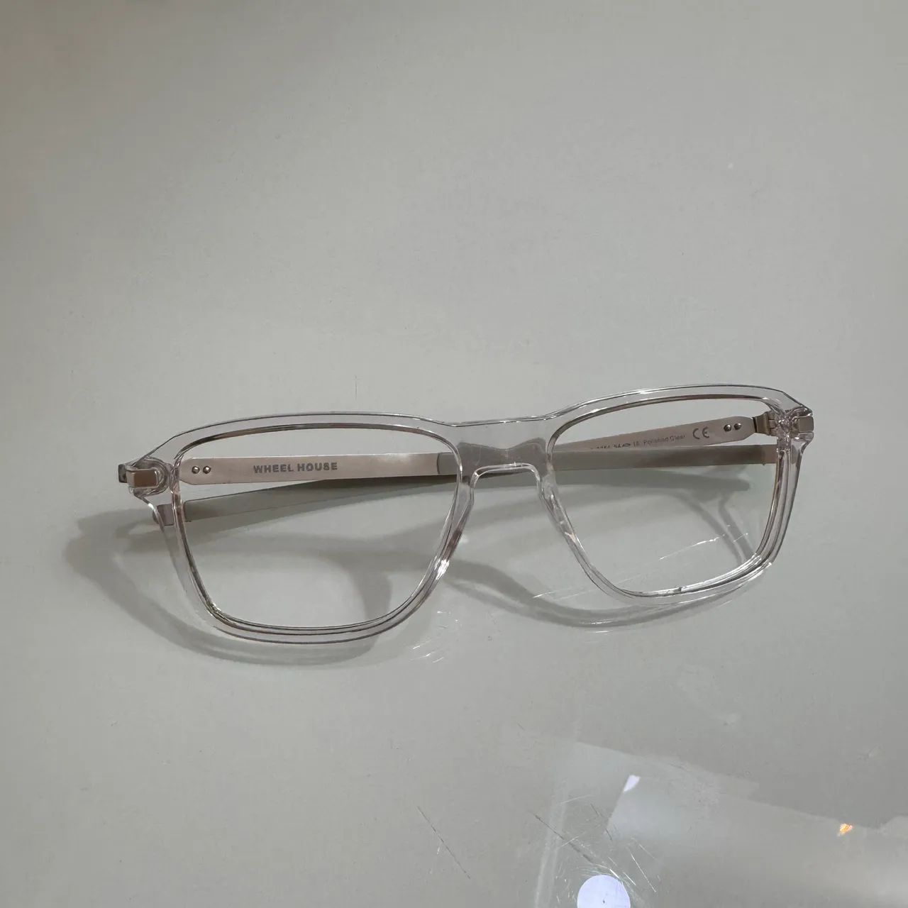 armação oakley wheel house original polished clear