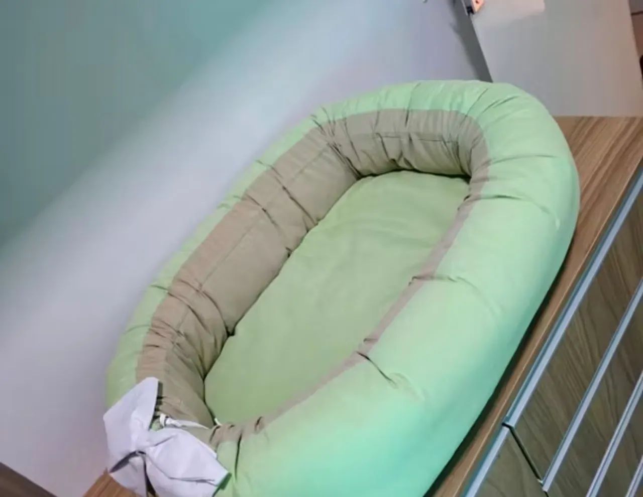 Ninho redutor de berço 