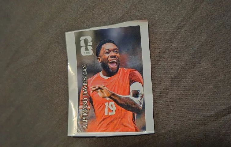 Figurinha Coca Cola CC11 Alphonso Davies copa do mundo 2026