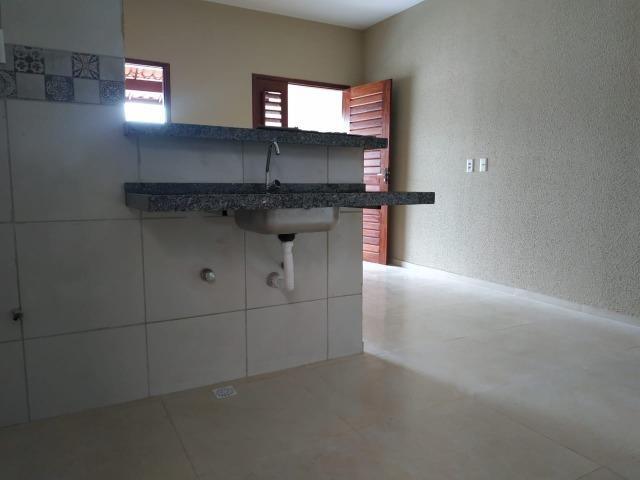 Entrada parcelada, escritura grátis, 2 quartos, 2 wc's, garagem, varanda, sala, coz - Foto 4