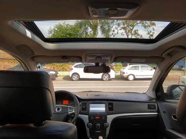 Korando 2.0 diesel aut 4x4 com teto - Foto 8