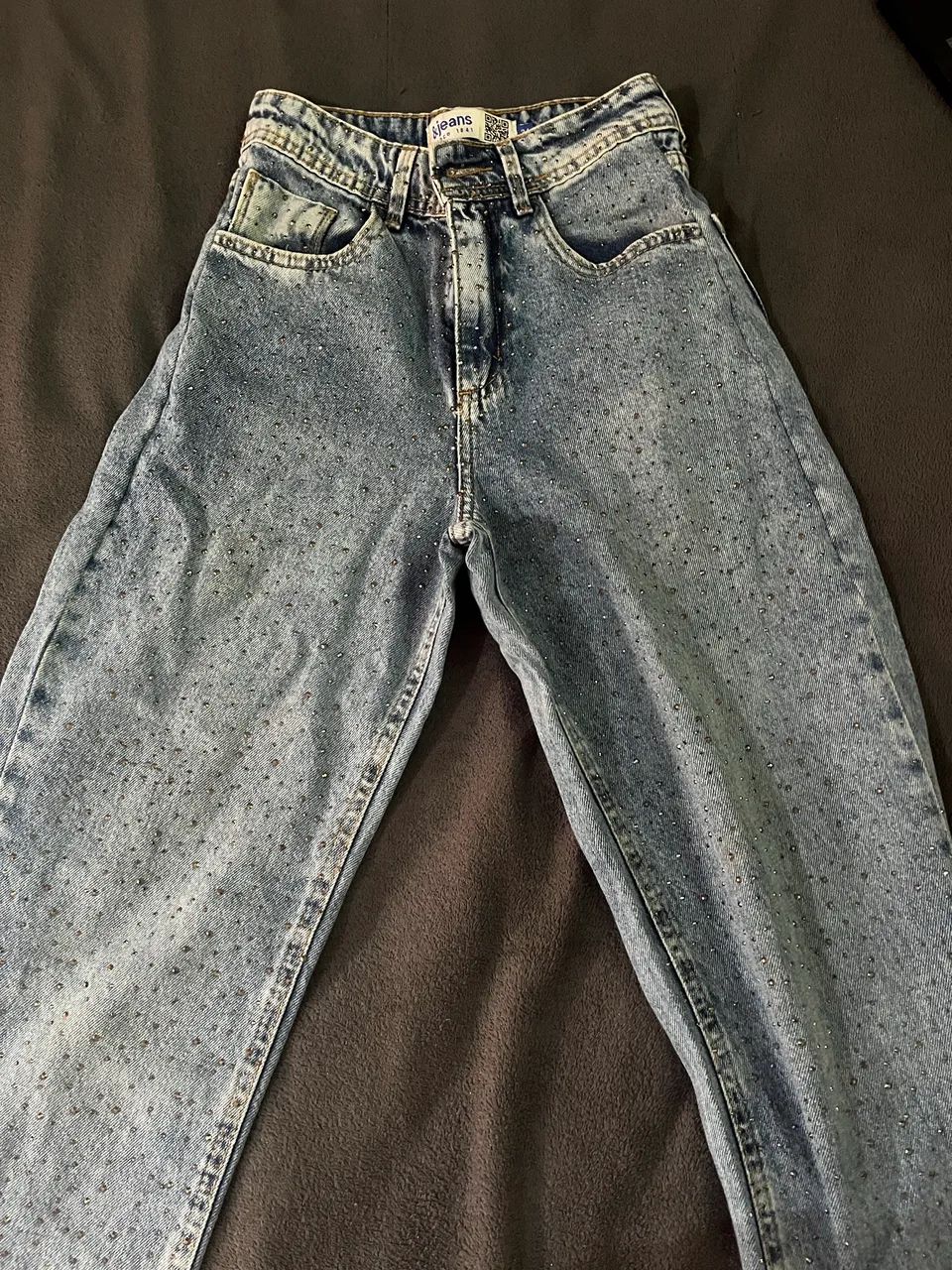 Calça jeans com stress 