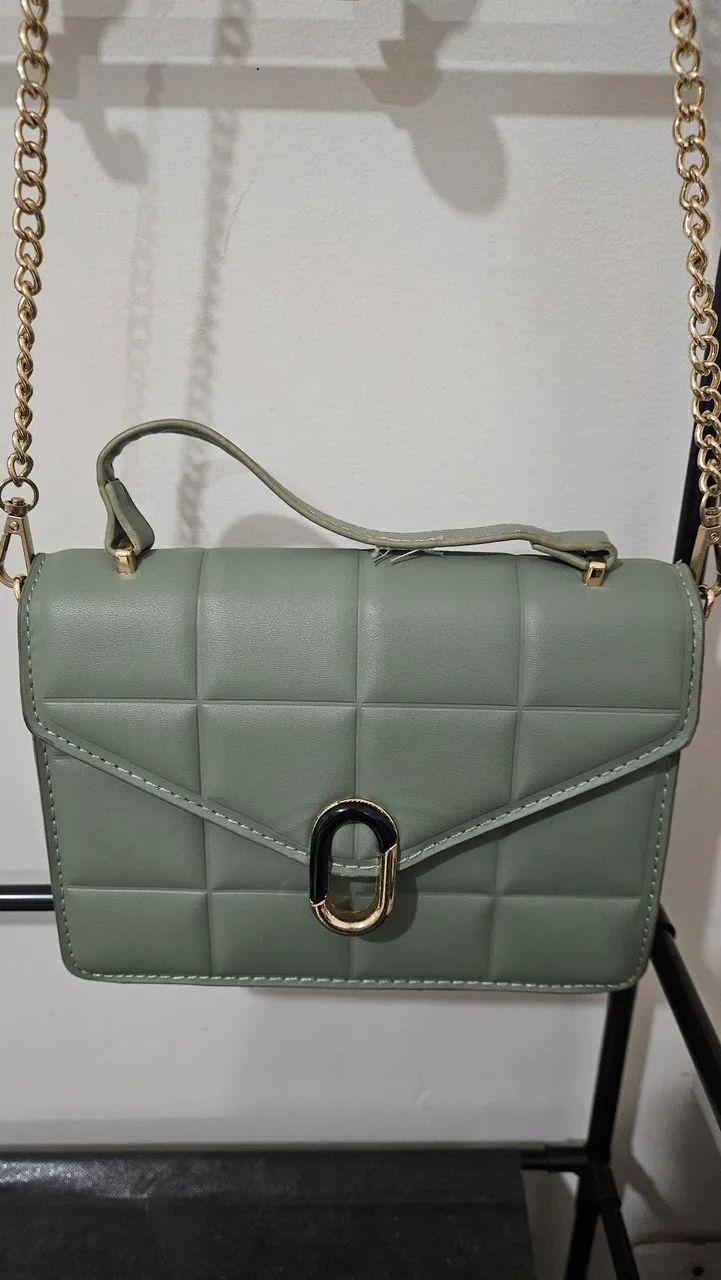 bolsa transversal matelassê verde
