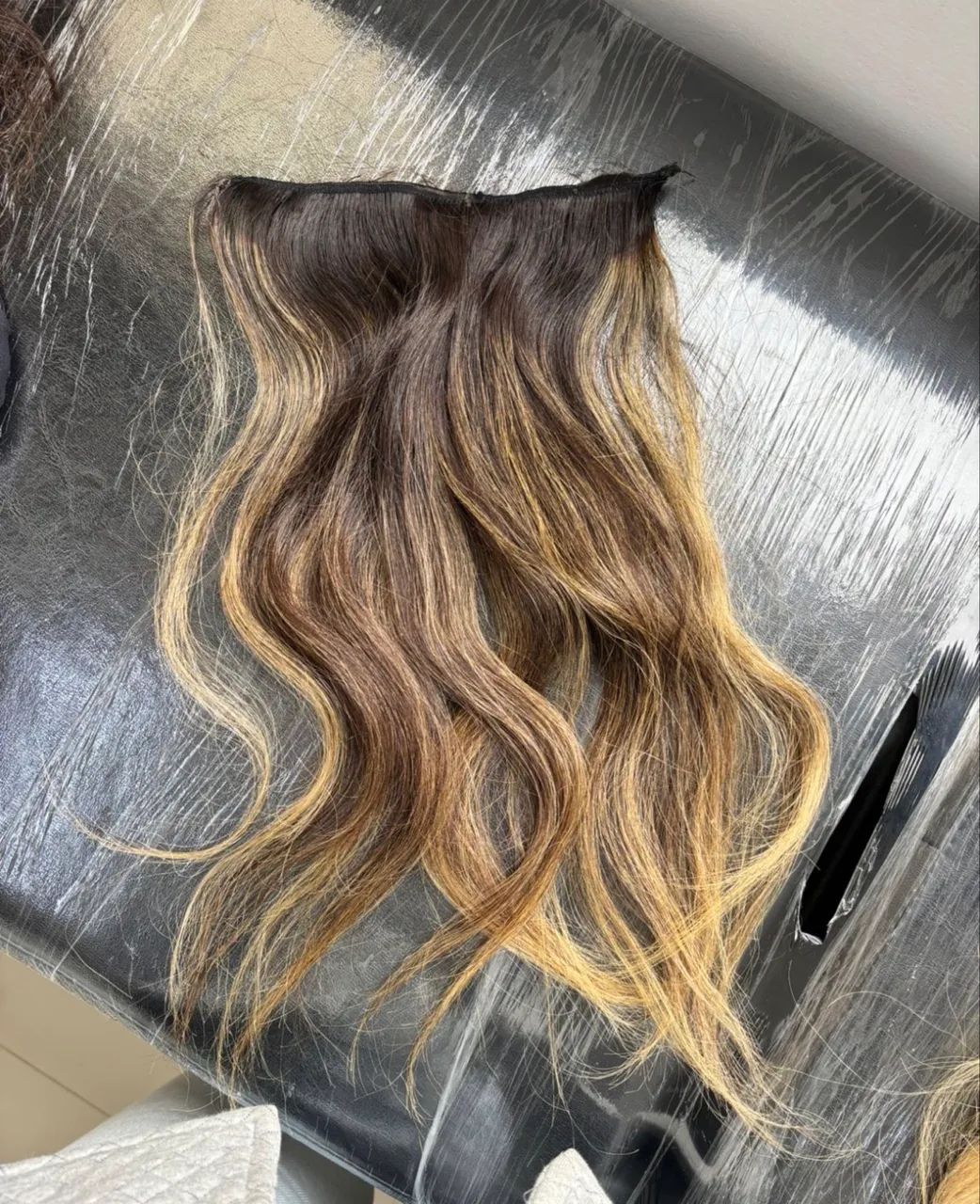 Três tiras de mega hair 