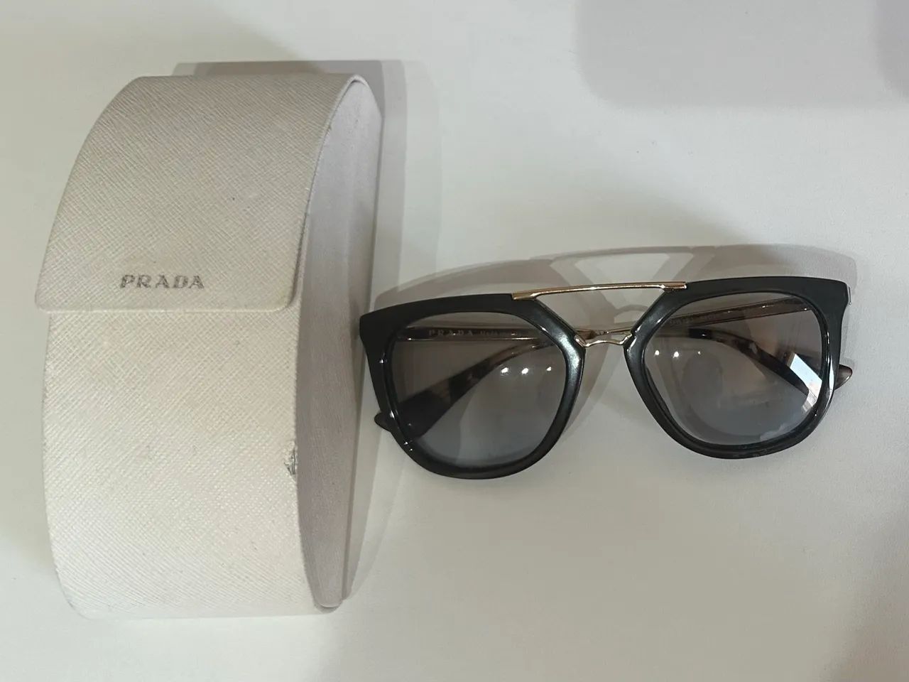 Óculos feminino Prada 