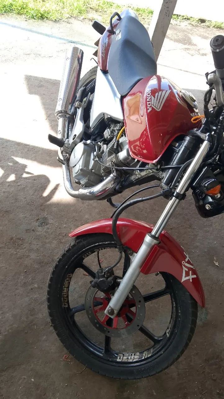 Sem multa , só documento atrasado.moto tá filé.so pegar e andar,ou troca em carro .